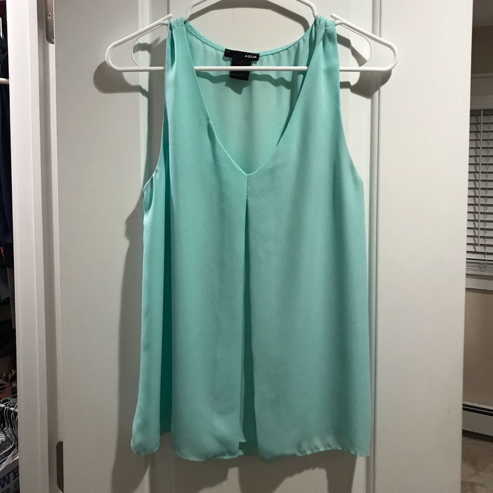 Aqua light blue top. Size small.